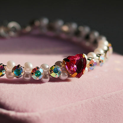 Bleikt hjartaarmband og eyrnalokkar