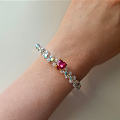 Bleikt hjartaarmband og eyrnalokkar